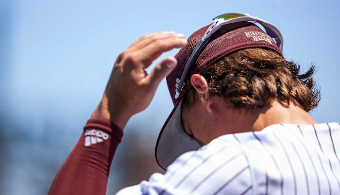 Mississippi State's Tanner Leggett adjusts his hat this past weekend against Missouri. The Bulldogs lost two out of three games to the Tigers and as a result, dropped a few spots in this week's national rankings. (Photo courtesy of Mississippi State athletics)